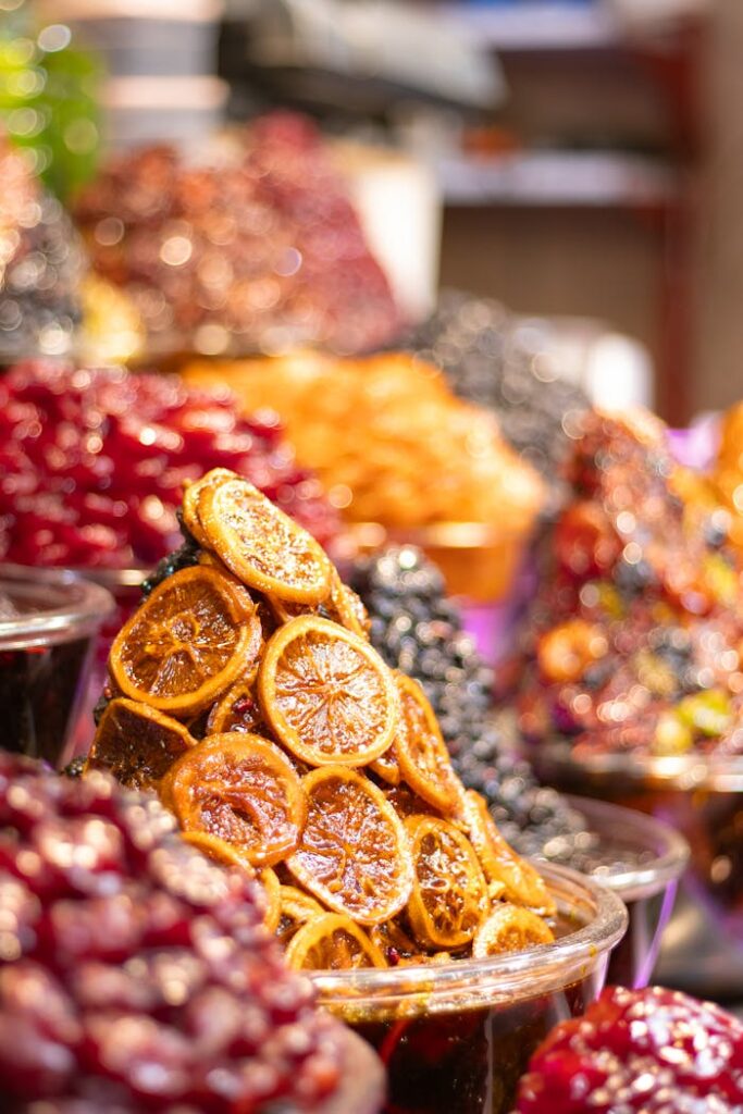 Colorful assortment of dried fruits in Darband Sar market, Tehran showcasing vibrant local produce.